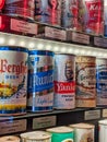 Close up, selective focus on old vintage beer cans inside a display case at the Taproom