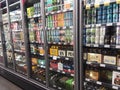 Beer and liquor fridge display inside a Whole Foods grocery store