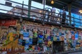 Colorful torn posters on grunge old walls at Pike place market in Seattle