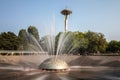 Seattle, Washington - 8/8/2018 : People outside enjoying a warm summer afternoon at the International Fountain in Seattle Center Royalty Free Stock Photo