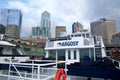 SEATTLE, WASHINGTON, USA - JAN 25th, 2017: Seattle skyline and waterfront at Pier 55, viewed from the water of Puget