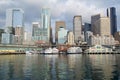 SEATTLE, WASHINGTON, USA - JAN 25th, 2017: A view on Seattle downtown from the waters of Puget Sound. Piers, skyscrapers Royalty Free Stock Photo