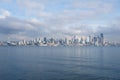 SEATTLE, WASHINGTON, USA - JAN 25th, 2017: A view on Seattle downtown from the waters of Puget Sound. Piers, skyscrapers Royalty Free Stock Photo