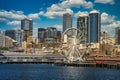 Seattle waterfront on Elliot Bay with the skyline of downtown and the Great Wheel Royalty Free Stock Photo