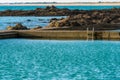 Seawater swimming pool at dusk in summer