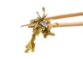 Seaweed on chopsticks isolated on white. Close up Royalty Free Stock Photo