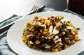 Seaweed Chuka sea kale salad with corn , crab sticks, eggs, onion on white plate Royalty Free Stock Photo