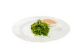 Seaweed salad with the dressing on the plate Royalty Free Stock Photo