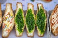 Seaweed salad sandwich for sell at street food market in Thailand . Tasty green seaweed salad sandwich close up Royalty Free Stock Photo