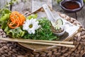 Seaweed Salad wakame in plate with chopsticks on bamboo mat. Japanese Cuisine - healthy sea food. Royalty Free Stock Photo