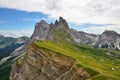 Seceda Mountain peak with green field, Italy, South Tyrol, Dolomites, St.Ulrich in Groeden, Val gardene Dolomites Royalty Free Stock Photo