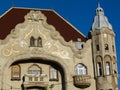 Secessionist style facade detail with balcony and white windows in Szeged, Hungary