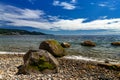 Pebbles, rocks and blue skies - Sechelt Beach, Sunshine Coast, BC, Canada