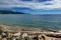 Rocks and trunks on Sechelt Beach, Sunshine Coast, BC, Canada