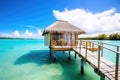 seclude overwater bungalow with private deck and steps into sea Royalty Free Stock Photo