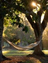 A secluded hammock sways beneath a lush canopy of trees, creating a serene, hidden oasis in this enchanting forest Royalty Free Stock Photo