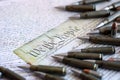 The second amendment and gun control in america concept. Bullets on american constitution Royalty Free Stock Photo