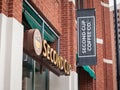 Second Cup Coffee logo in front of their local cafe in downtown Ottawa, Ontario.