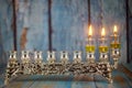 Second day Hanukkah candles are burning on light of the Jewish holiday Royalty Free Stock Photo