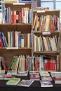 Second hand books displayed in a book case Royalty Free Stock Photo