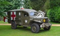 Second World War Ambulance parked in front of trees