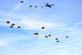 Airplane dropping para troopers at memorial day airborne