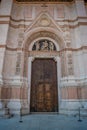 Secondary door of the Basilica of San Petronio in Piazza Maggiore in Bologna, Italy Royalty Free Stock Photo