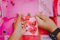 Secondary school students make Valentine cards