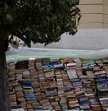 pile of books at a flea market