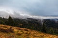 Seconds before sunrise Mountain top, foggy morning Royalty Free Stock Photo