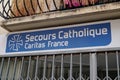 Secours catholique caritas france logo sign and brand text of Rescue Catholic help