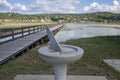 Secovlje Saltworks, Piran / SLOVENIA - September 9, 2019: Beautiful artwork of sun-dial besides souvenir shop in soline