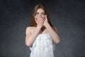 Secrecy, reluctance, talkativeness concept. Woman closed her mouth with her hands Royalty Free Stock Photo