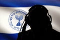 Secret agent of the Israeli intelligence eavesdropping on conversations, spy and special agent, the Israeli flag of the special Royalty Free Stock Photo