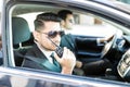 Secret Agent Using Walkie-Talkie In Car Royalty Free Stock Photo