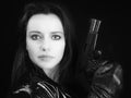 Secret agent woman with gun Royalty Free Stock Photo