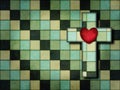 Secret christian cross with heart camouflaged on a checkerboard background