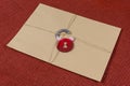 A secret envelope, a parcel bound with a rope, with symbolic lock. Open the lock.