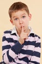 The secret. Finger over mouth. Psst. Royalty Free Stock Photo