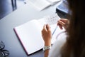 Secret, note and student with love letter in class at high school with girl and social communication. Hand, paper and Royalty Free Stock Photo