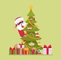 Secret Santa Claus wearing mask hiding behind a christmas tree Royalty Free Stock Photo