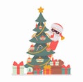 Secret Santa Claus wearing mask hiding behind a christmas tree Royalty Free Stock Photo