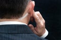Secret Service Agent Listens To Earpiece, Behind Royalty Free Stock Photo