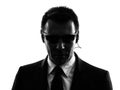 Secret service security bodyguard agent man silhouette Royalty Free Stock Photo