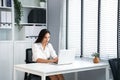 Secretary day with Asian professional assistance woman typing keyboard, working business and clear task management on computer in Royalty Free Stock Photo