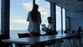 Secretary giving businessman papers in conference hall. Executive check contract Royalty Free Stock Photo