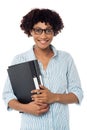 Secretary holding business files, expressing excitement Royalty Free Stock Photo