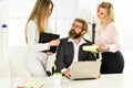 Secretary and manager. Office affair. Surrounded by beautiful ladies. Seductive colleague. Flirting with boss. Man and Royalty Free Stock Photo