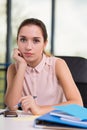 Secretary sitting at the desk Royalty Free Stock Photo