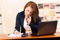 Secretary using cell phone Royalty Free Stock Photo